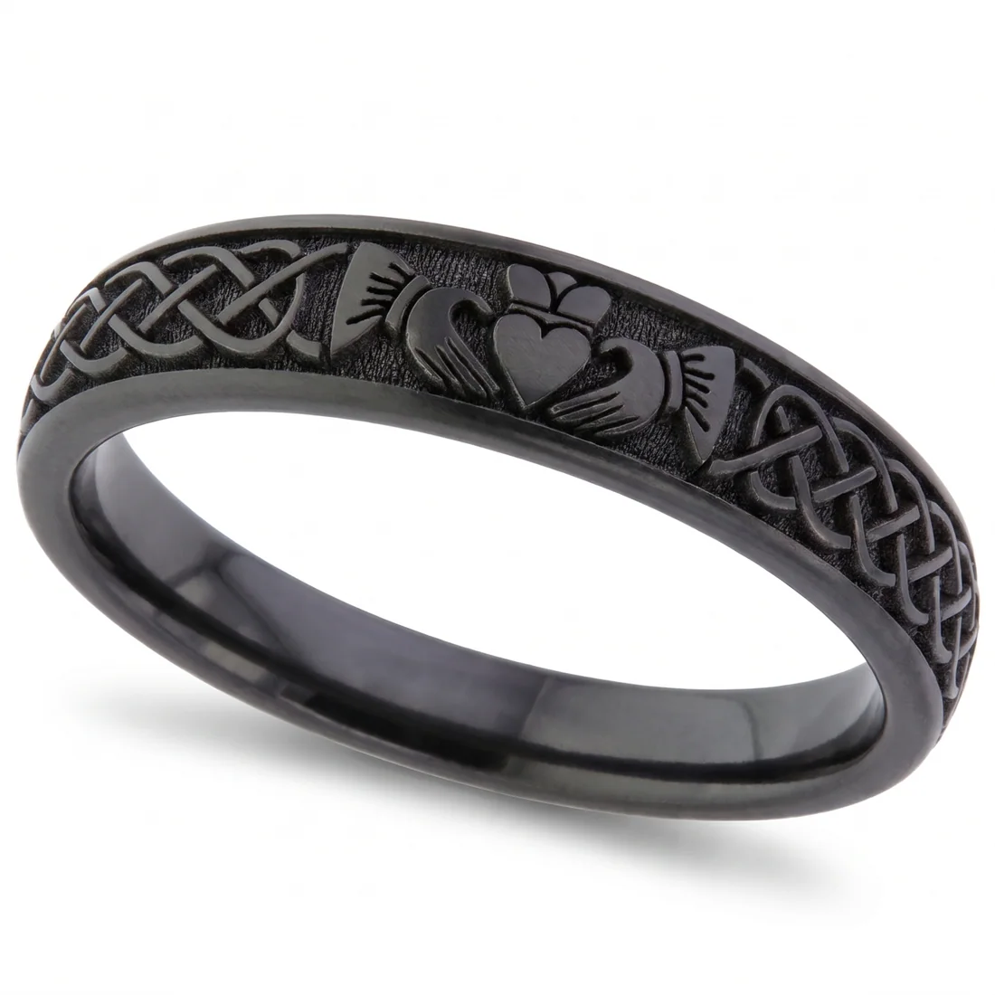 Claddagh, black, The claddagh, hands, heart and crown, cut into black.