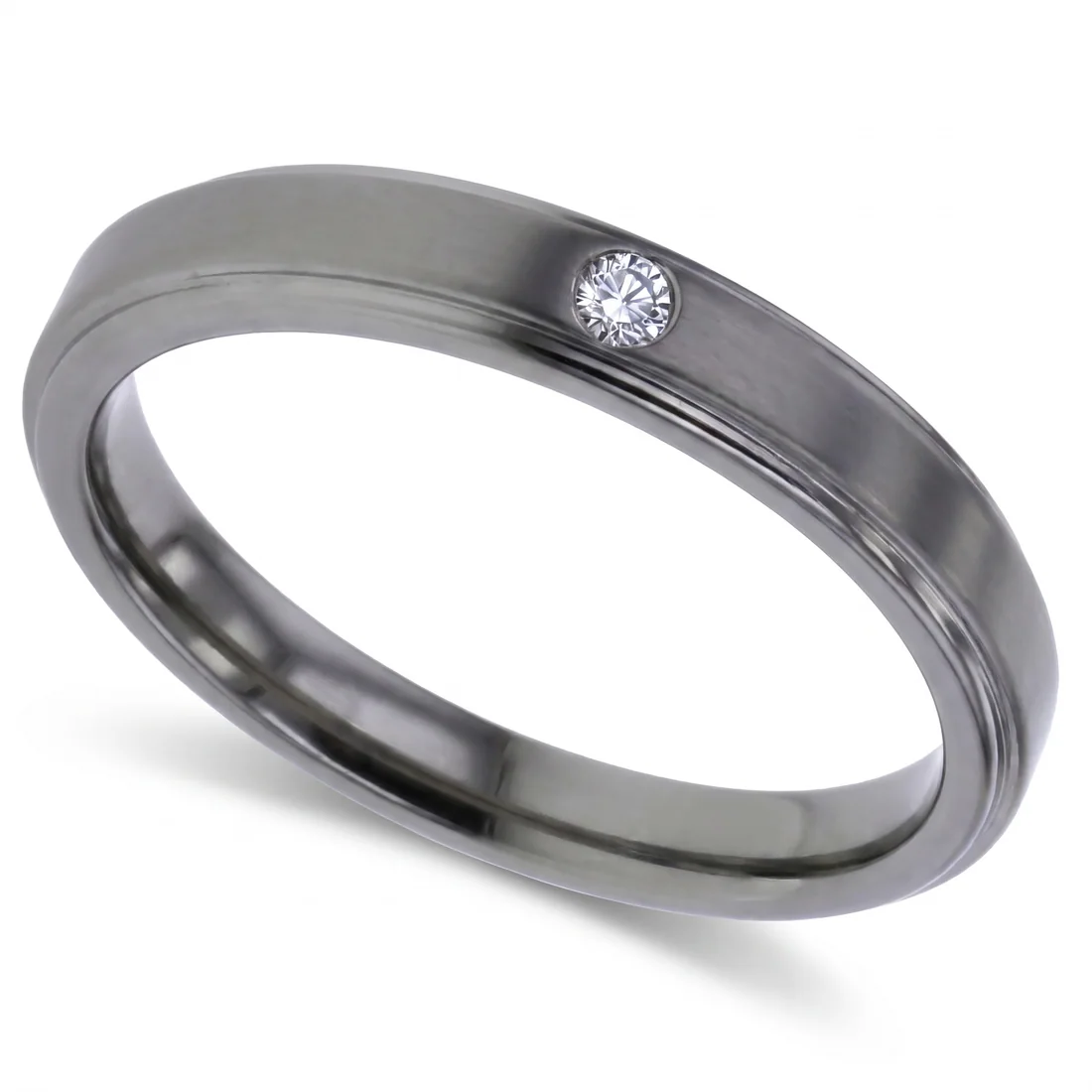 Diamond set, titanium, One small diamond, flush set into brushed titanium.
