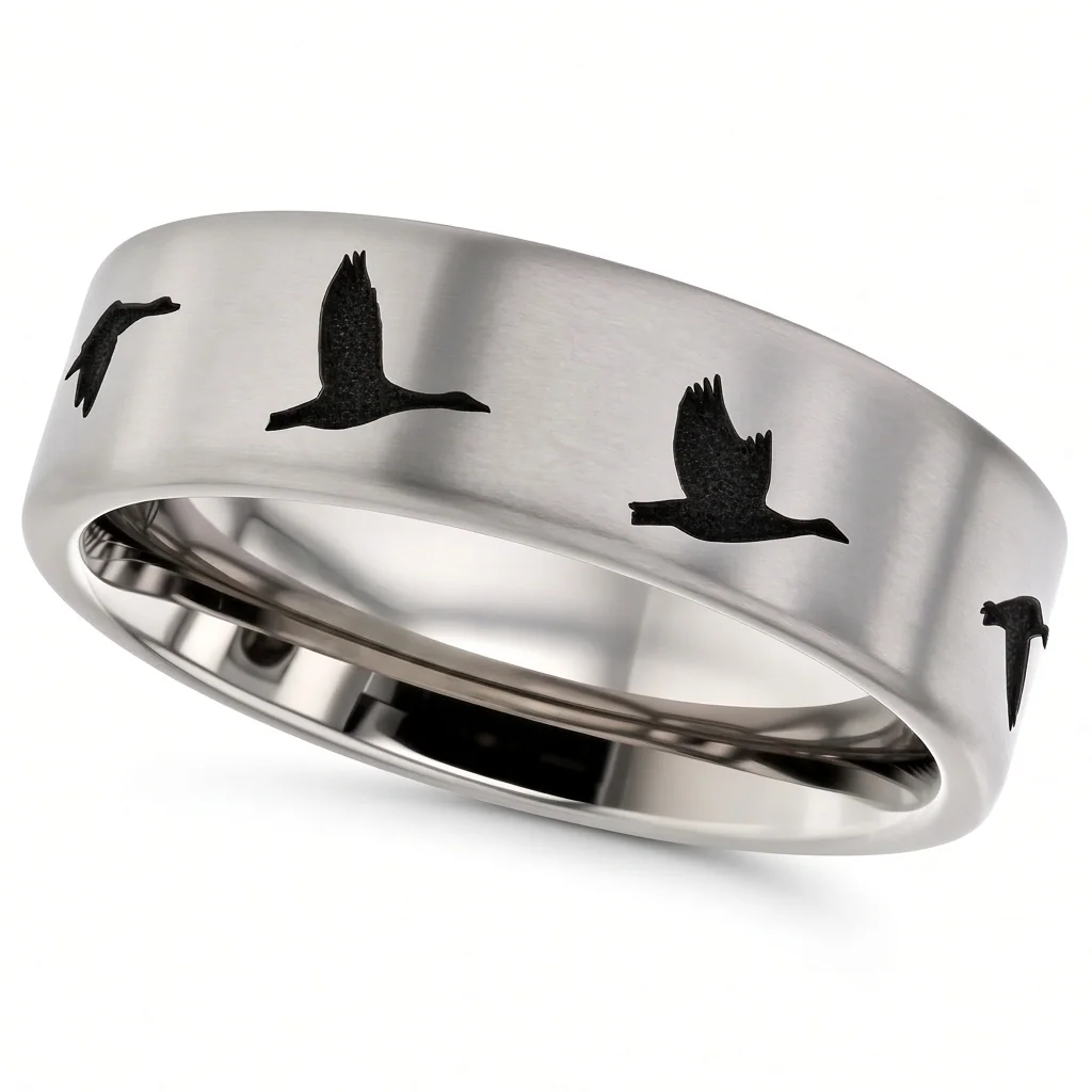 Flying geese, titanium, Geese in flight, engraved around a titanium band.