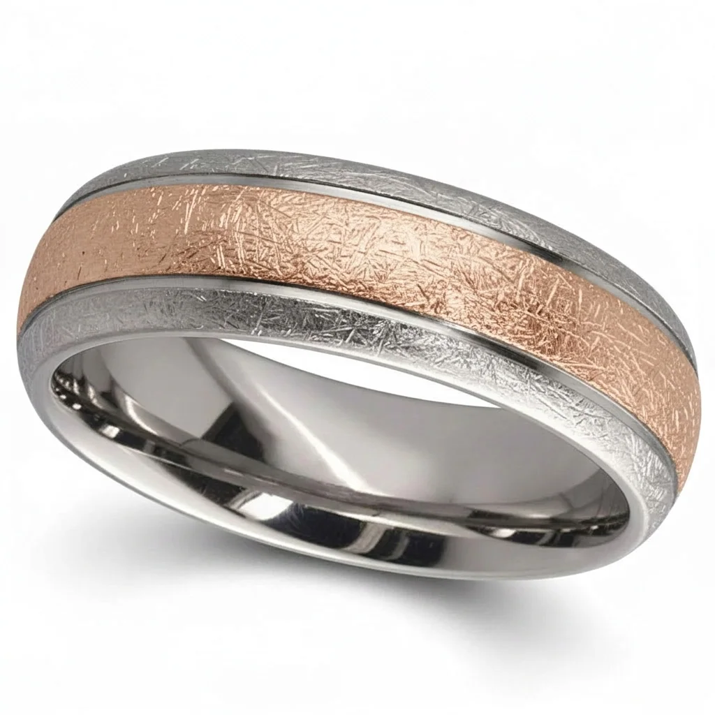 Hammered gold inlay, titanium, A wide gold inlay, hammered by hand.