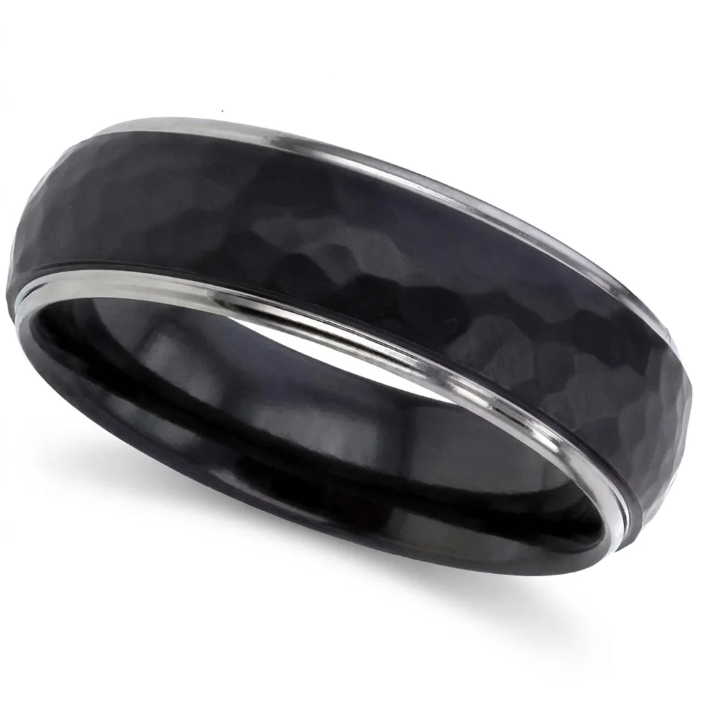 Hammered black, bright edges, A hammered black dome with bright natural metal at both edges.