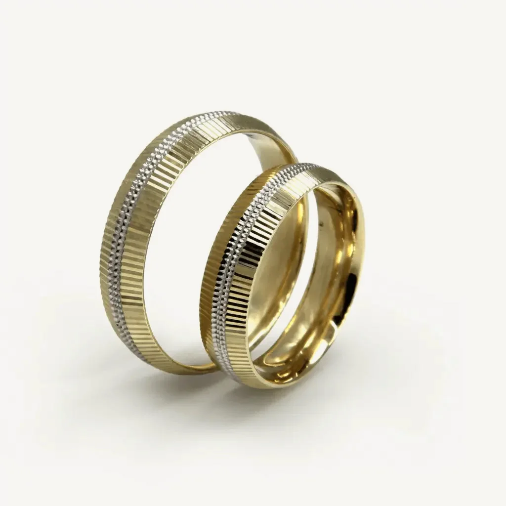 Linear ribbed wedding rings, his and hers together