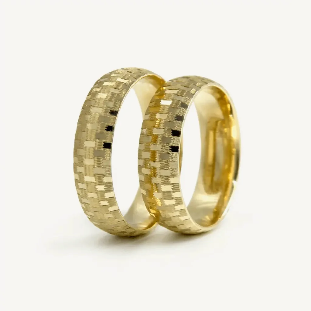 Mosaic wedding rings, his and hers together