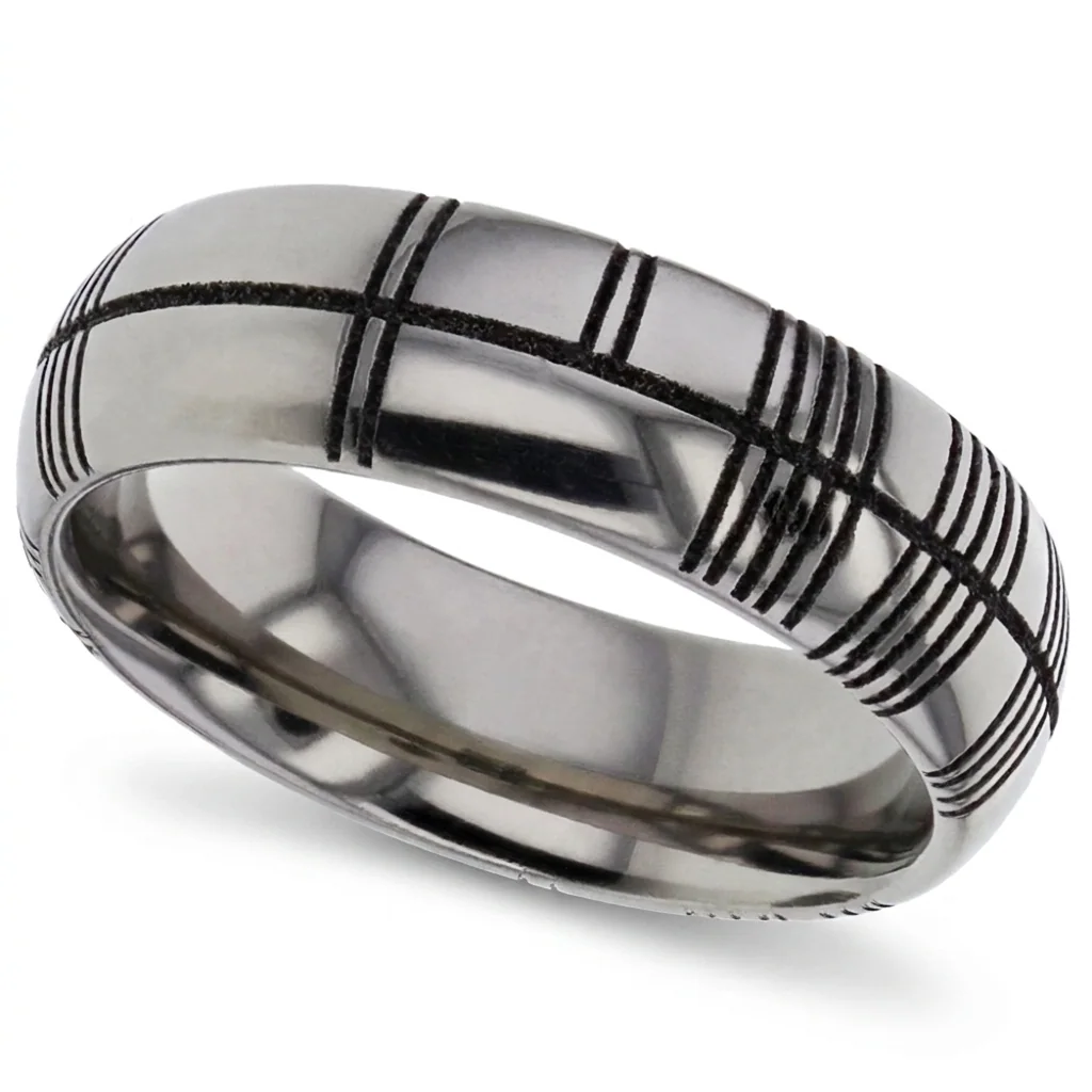 Ogham, titanium, Ancient Irish script, cut as lines across the band.