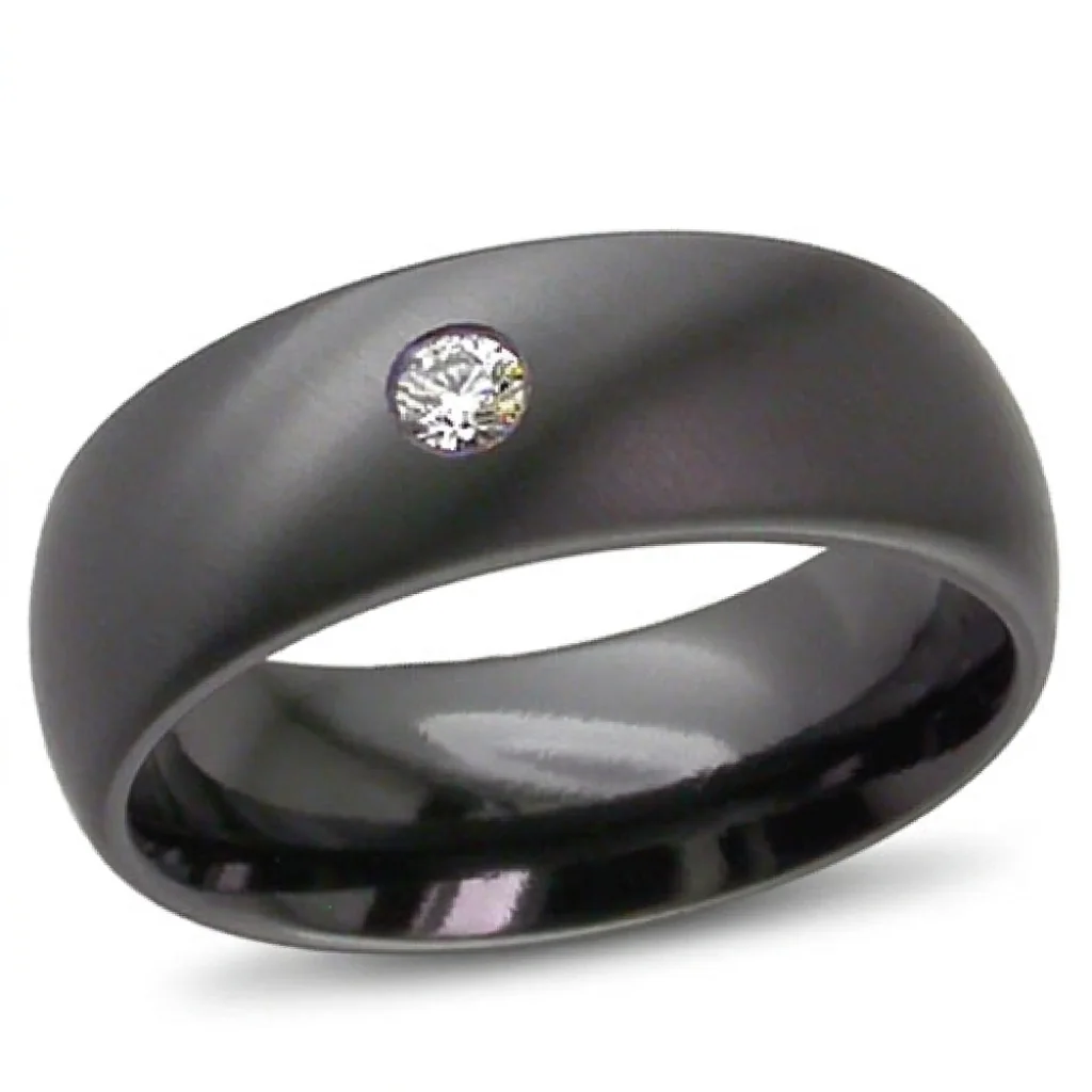One diamond, black, A single ten point diamond, flush set into black.