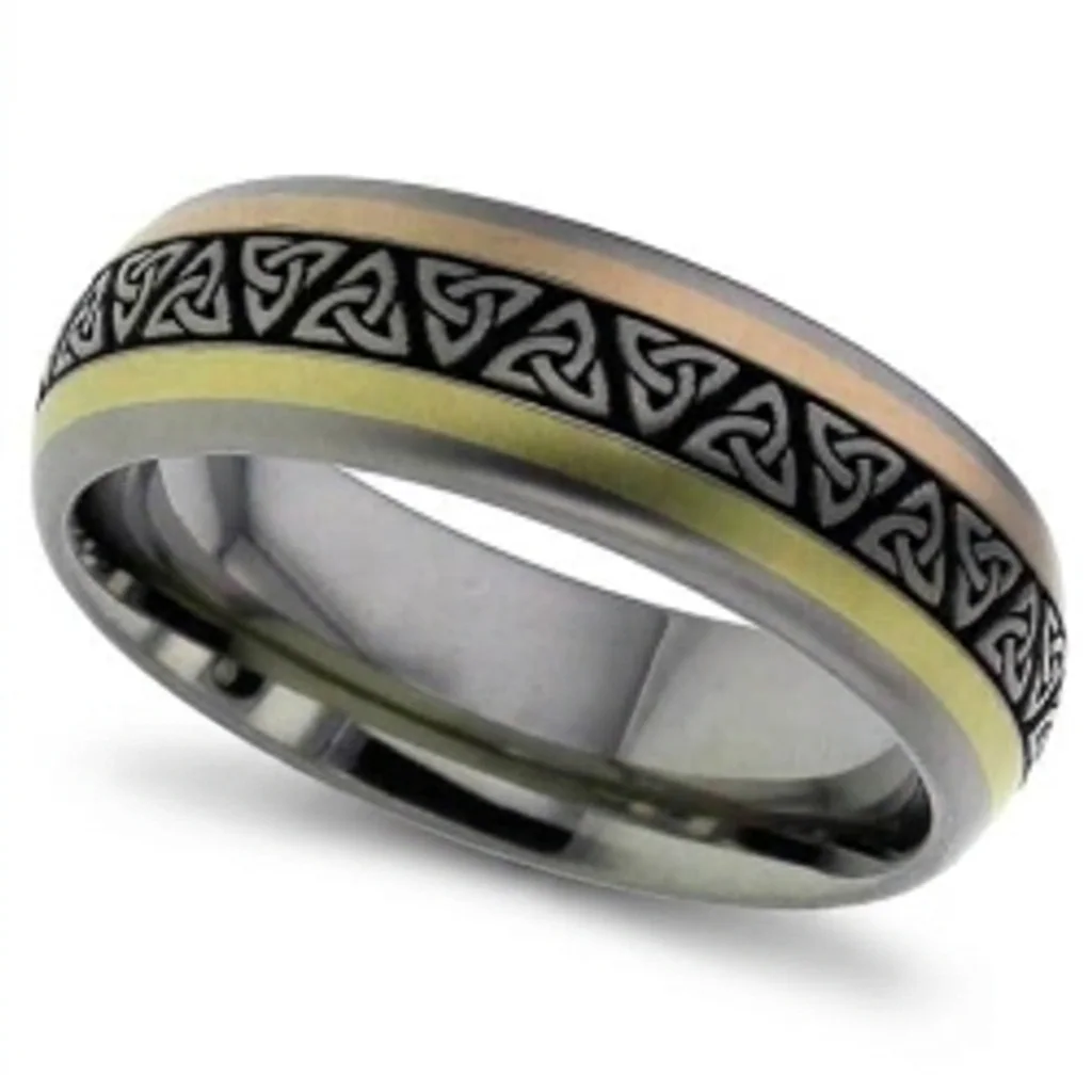 Trinity knots, gold inlay, Trinity knots cut through a solid gold inlay.