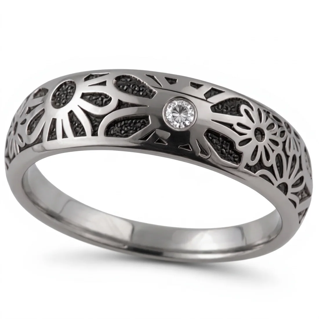 Wildflowers, diamond set, Flowers cut around the band, with one diamond set among them.